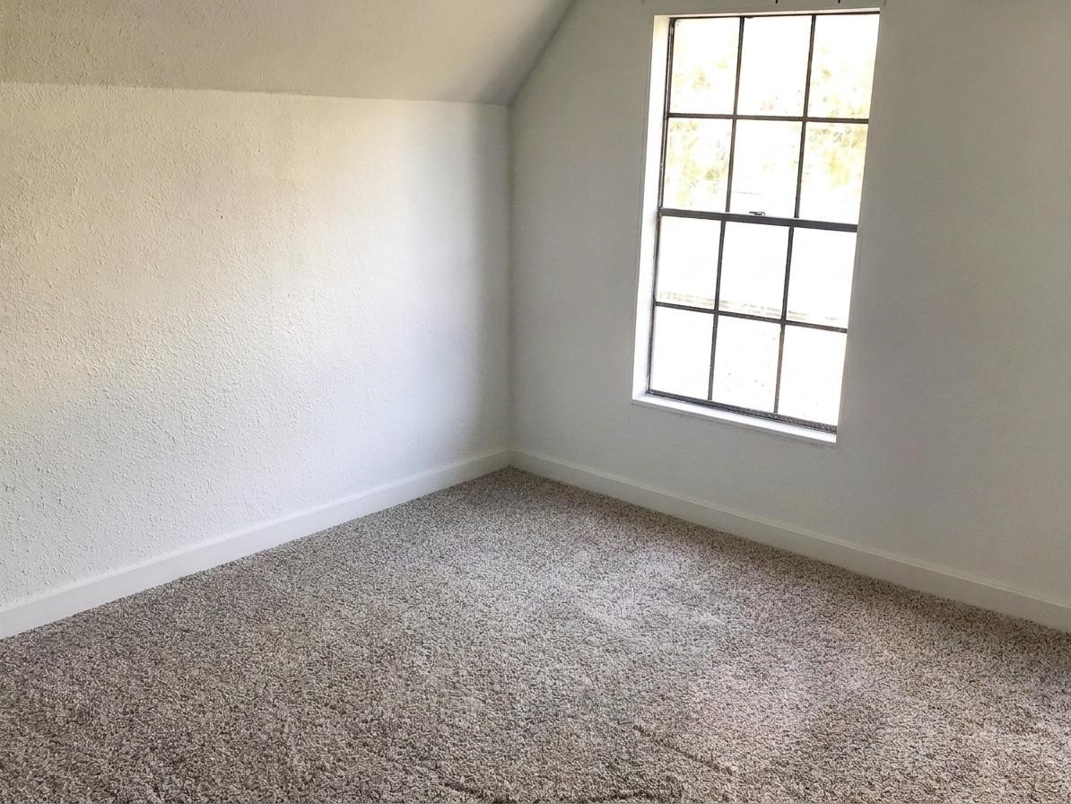 24300 County Road 332 Sweeny, TX 77480 - Photo 12 of 27 an empty room with a window