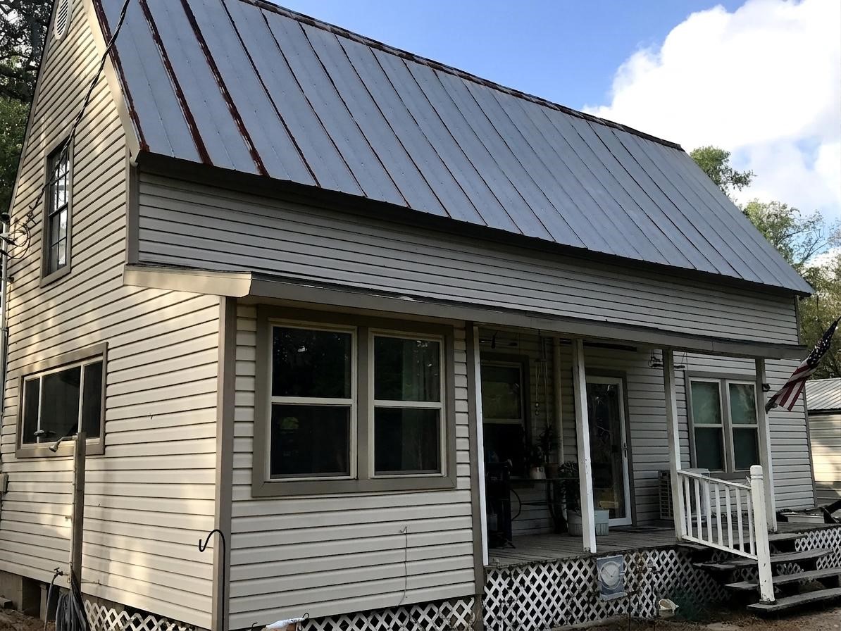24300 County Road 332 Sweeny, TX 77480 - Photo 2 of 27 a view of a house with a door and wooden floor
