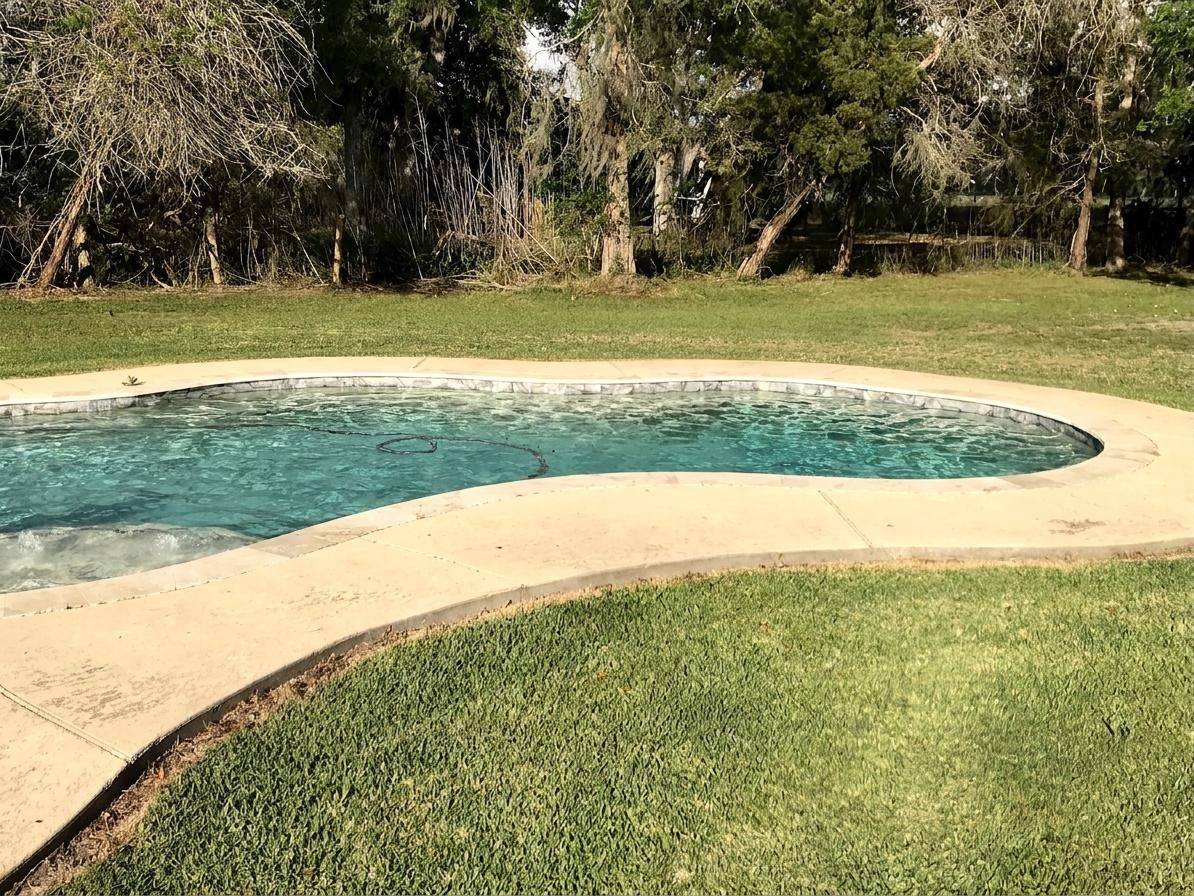 24300 County Road 332 Sweeny, TX 77480 - Photo 6 of 27 a view of a backyard