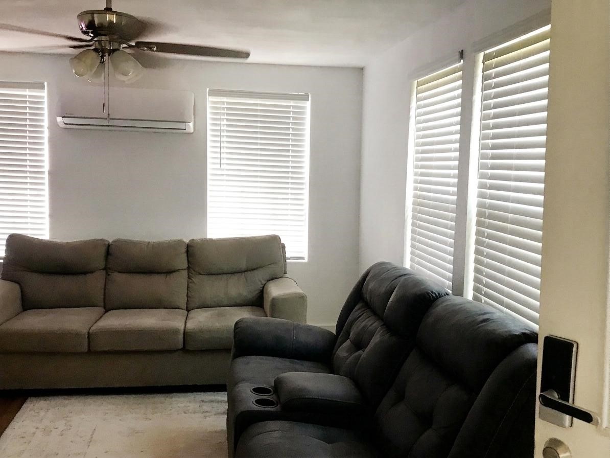 24300 County Road 332 Sweeny, TX 77480 - Photo 8 of 27 a living room with furniture and a window