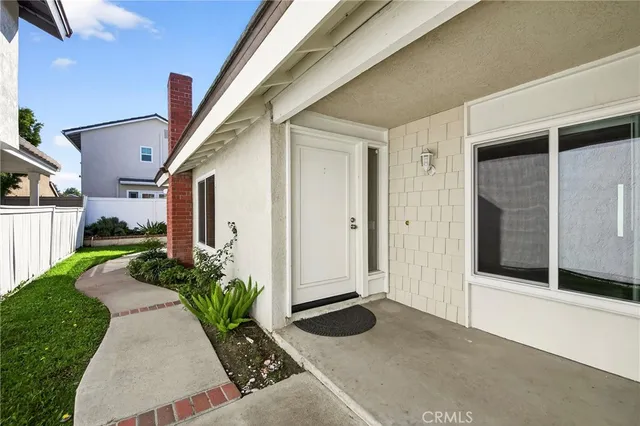 a front view of a house with garage