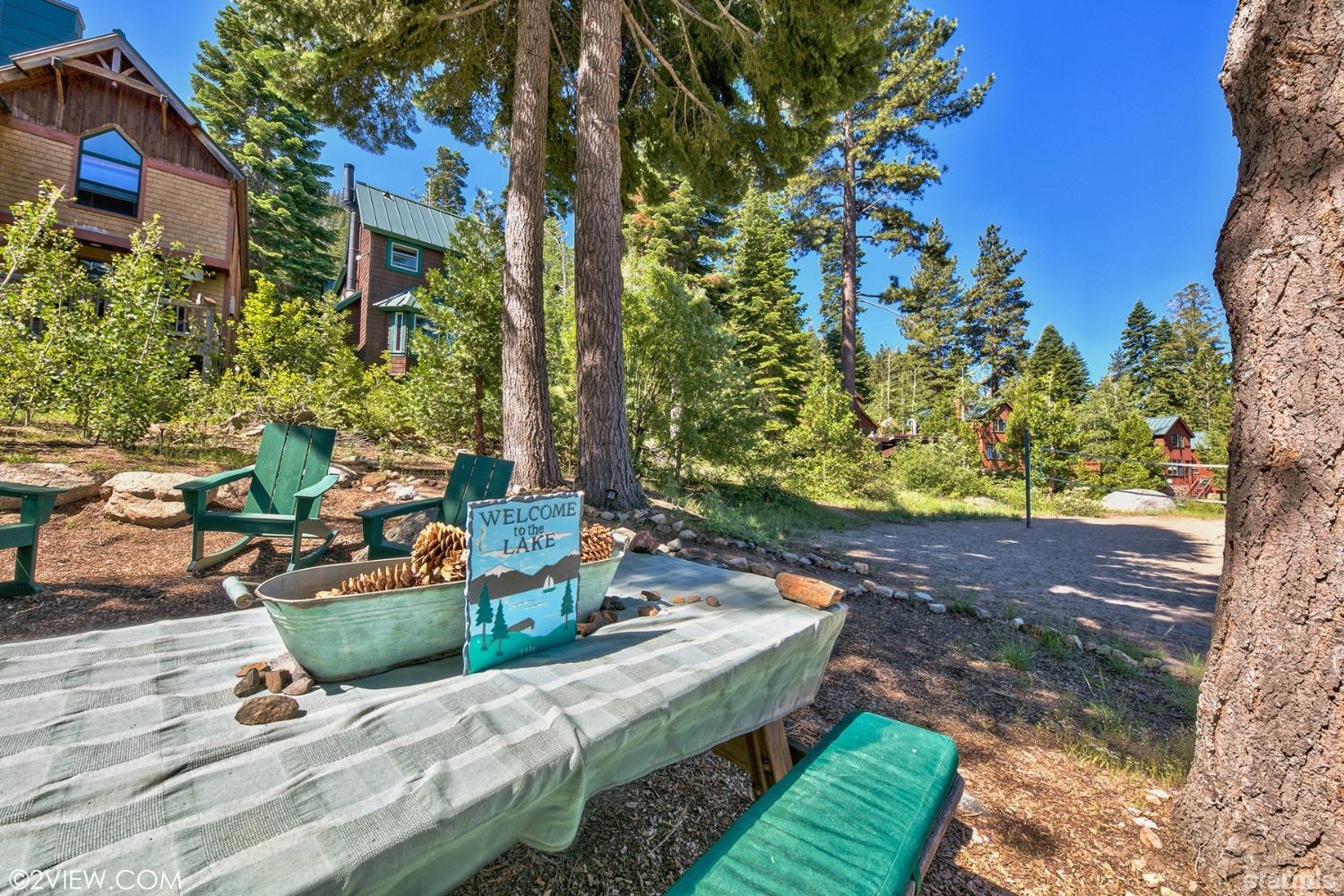 373 Fallen Leaf Road Fallen Leaf, CA 96150 - Photo 27 of 40 a view of a backyard with plants and a patio