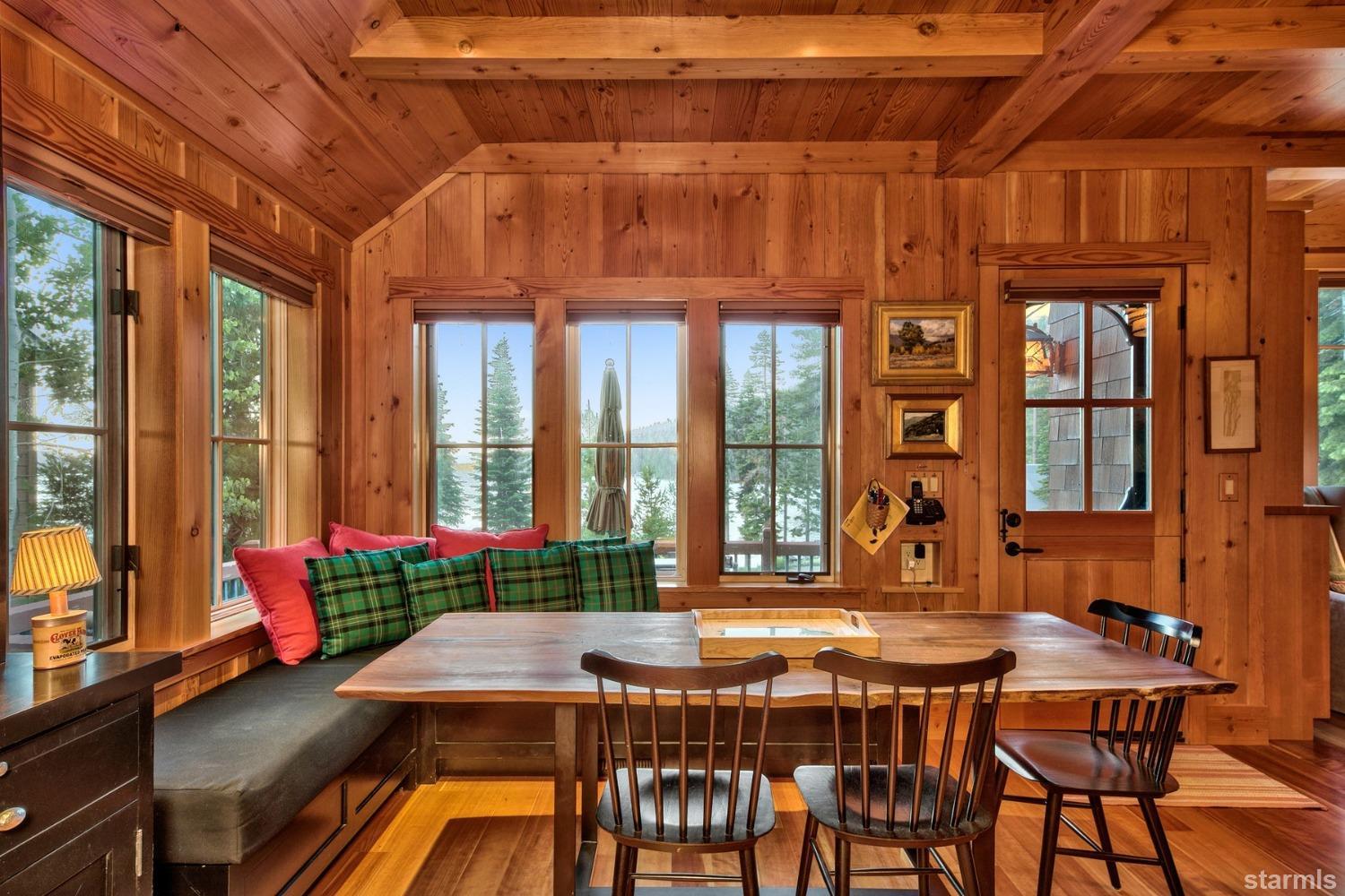 373 Fallen Leaf Road Fallen Leaf, CA 96150 - Photo 8 of 40 a dining room with furniture wooden floor and a potted plant