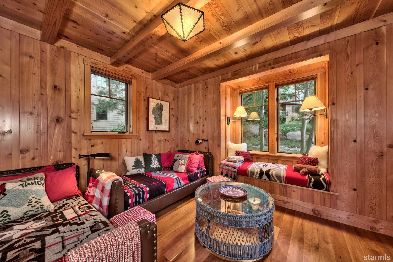 373 Fallen Leaf Road Fallen Leaf, CA 96150 - Photo 10 of 40 a living room with furniture and a large window