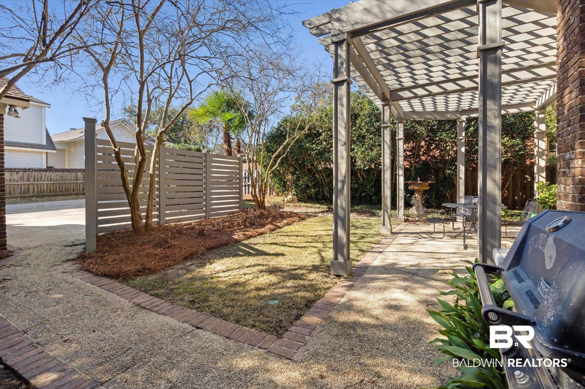 3615 Stein Street Mobile, AL 36608 - Photo 33 of 44 View of yard featuring a pergola and a patio area