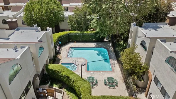 a view of a house with a street