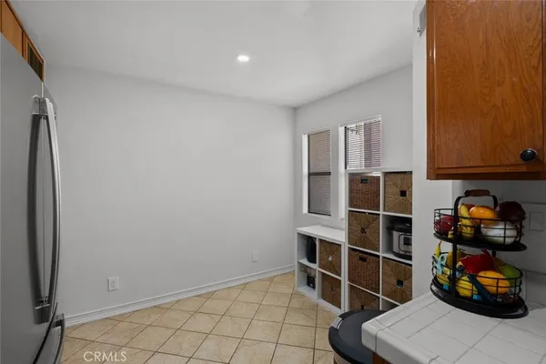 a view of workspace with wooden floor and window