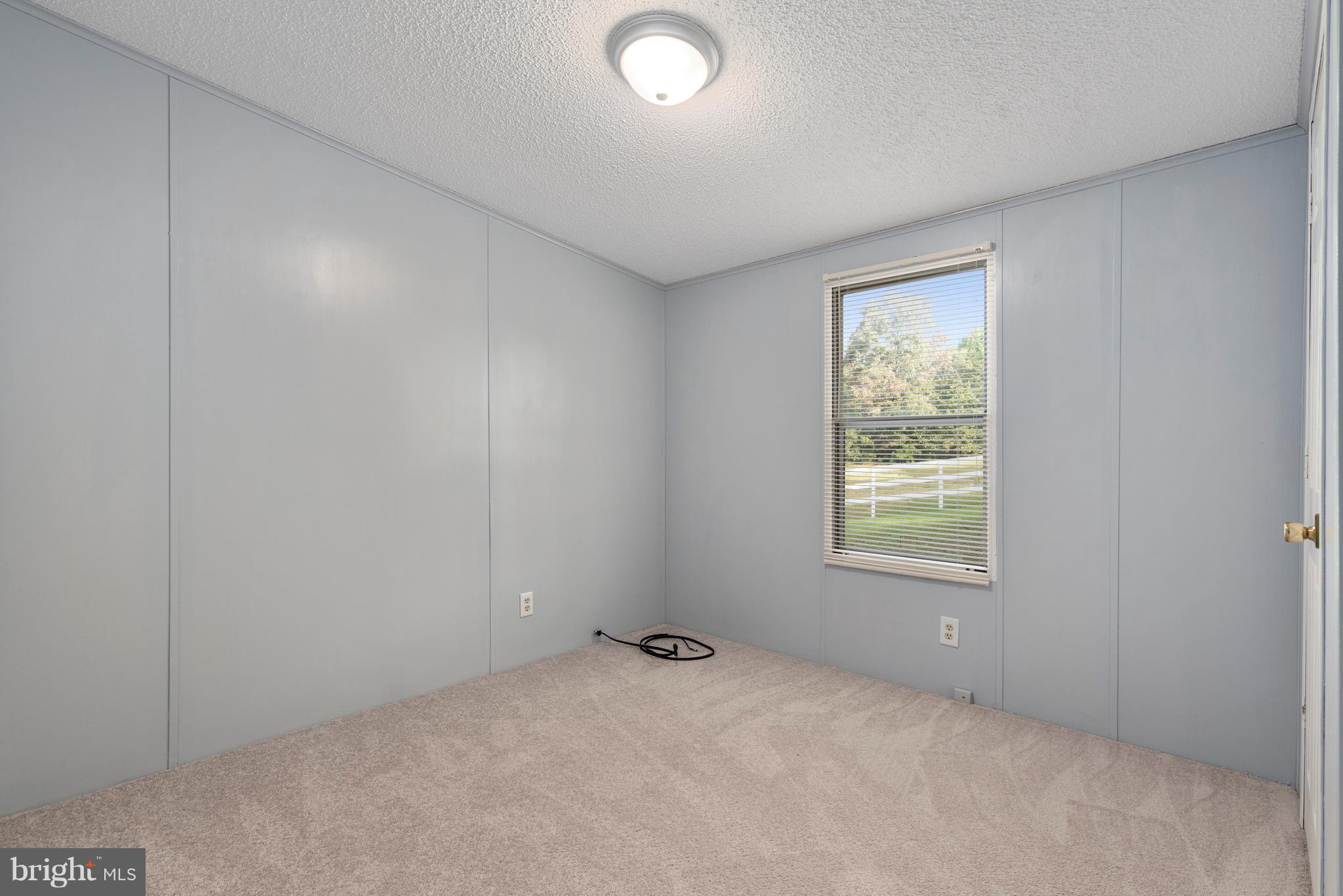 10000 Edenton Road Partlow, VA 22534 - Photo 14 of 30 an empty room with a window