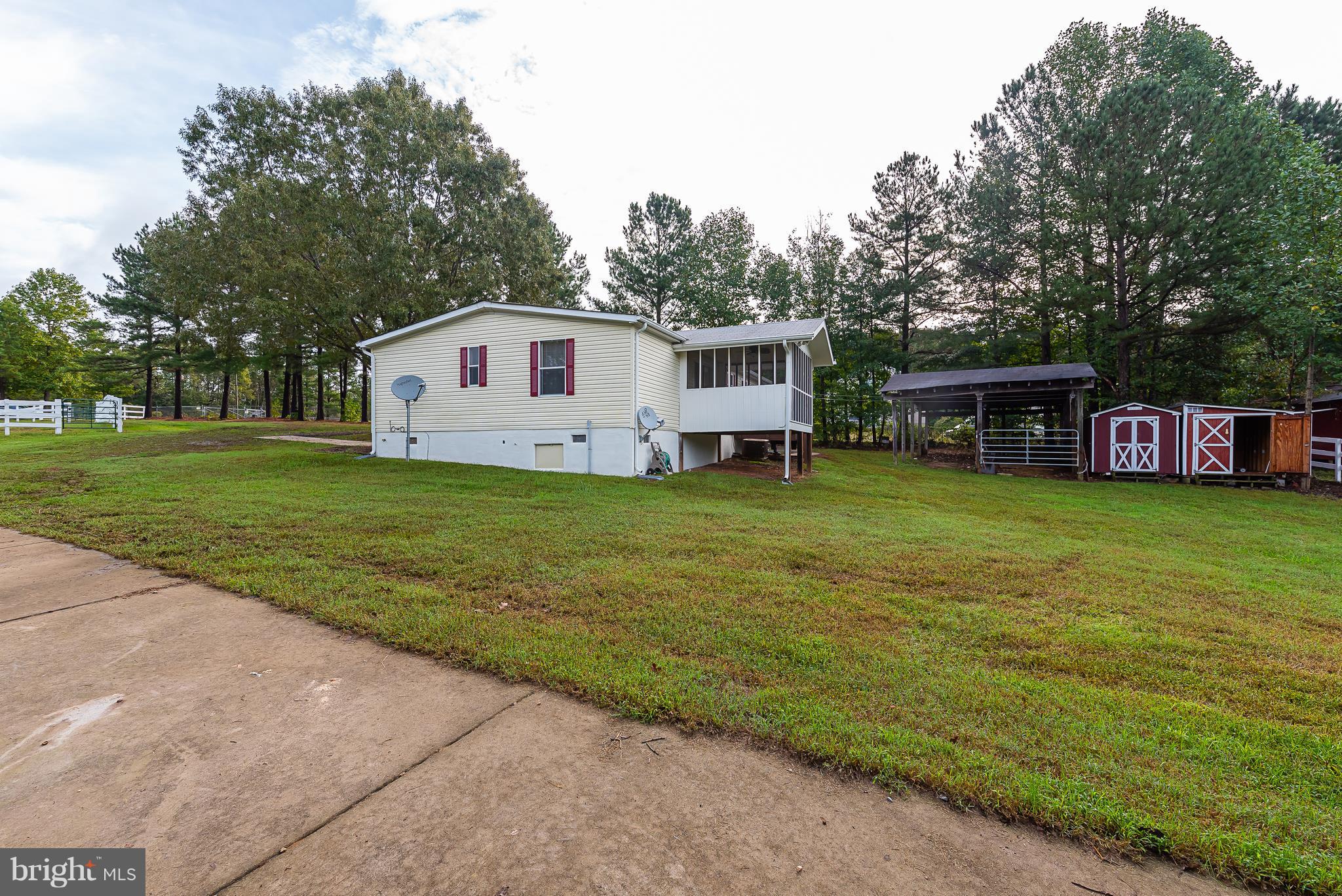 10000 Edenton Road Partlow, VA 22534 - Photo 18 of 30 a front view of a house with garden