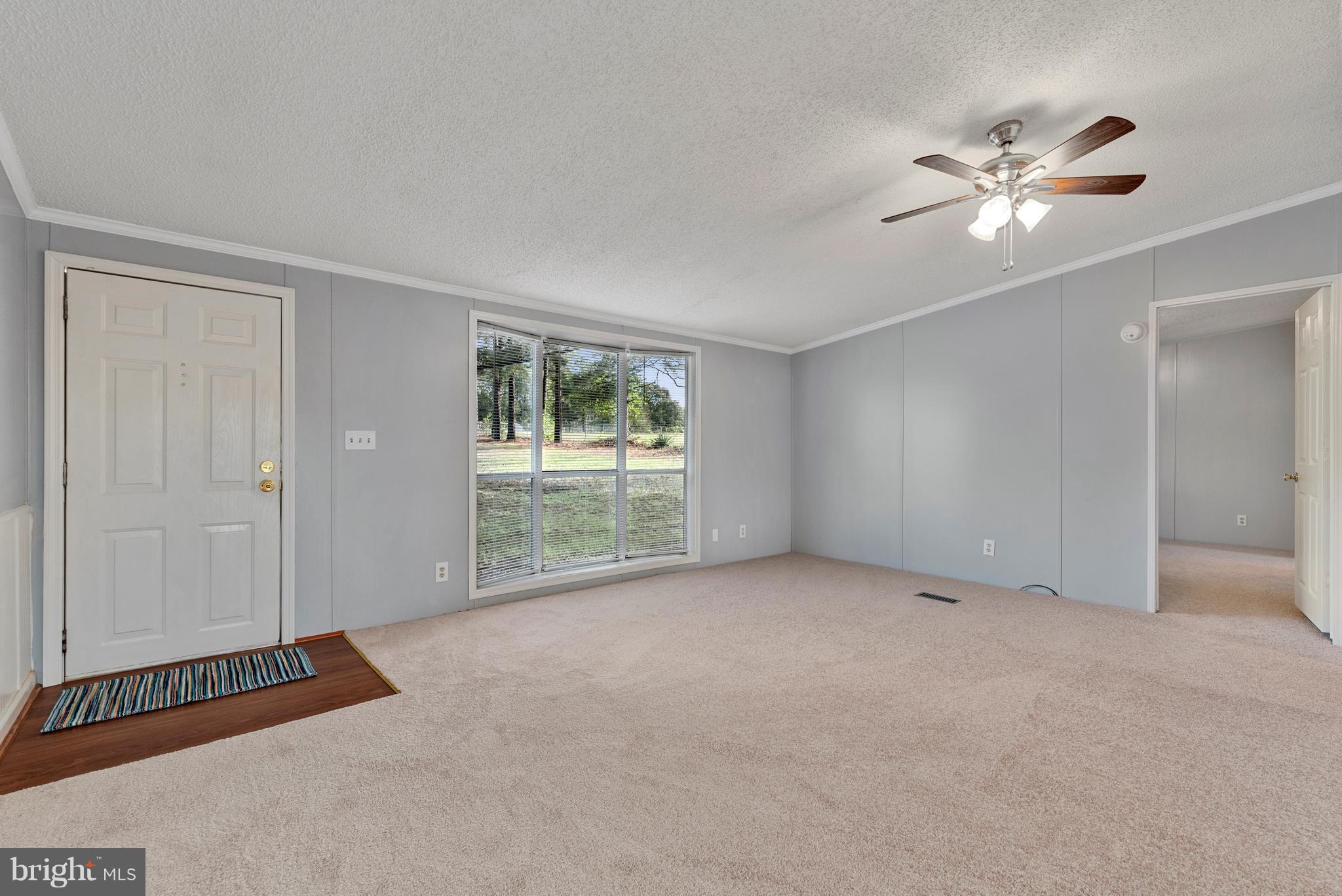 10000 Edenton Road Partlow, VA 22534 - Photo 3 of 30 a view of an empty room with a window