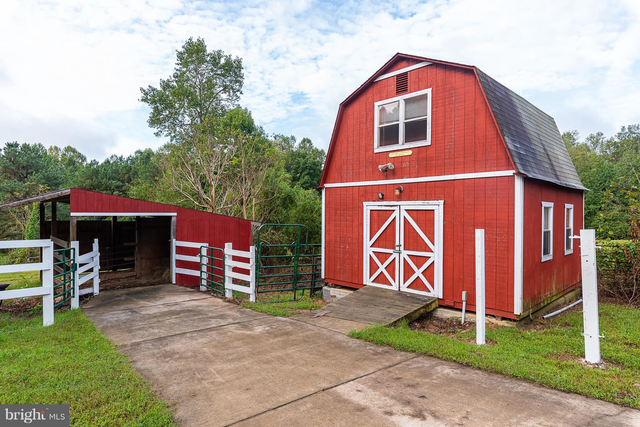 10000 Edenton Road Partlow, VA 22534 - Photo 21 of 30 a front view of a house with garden