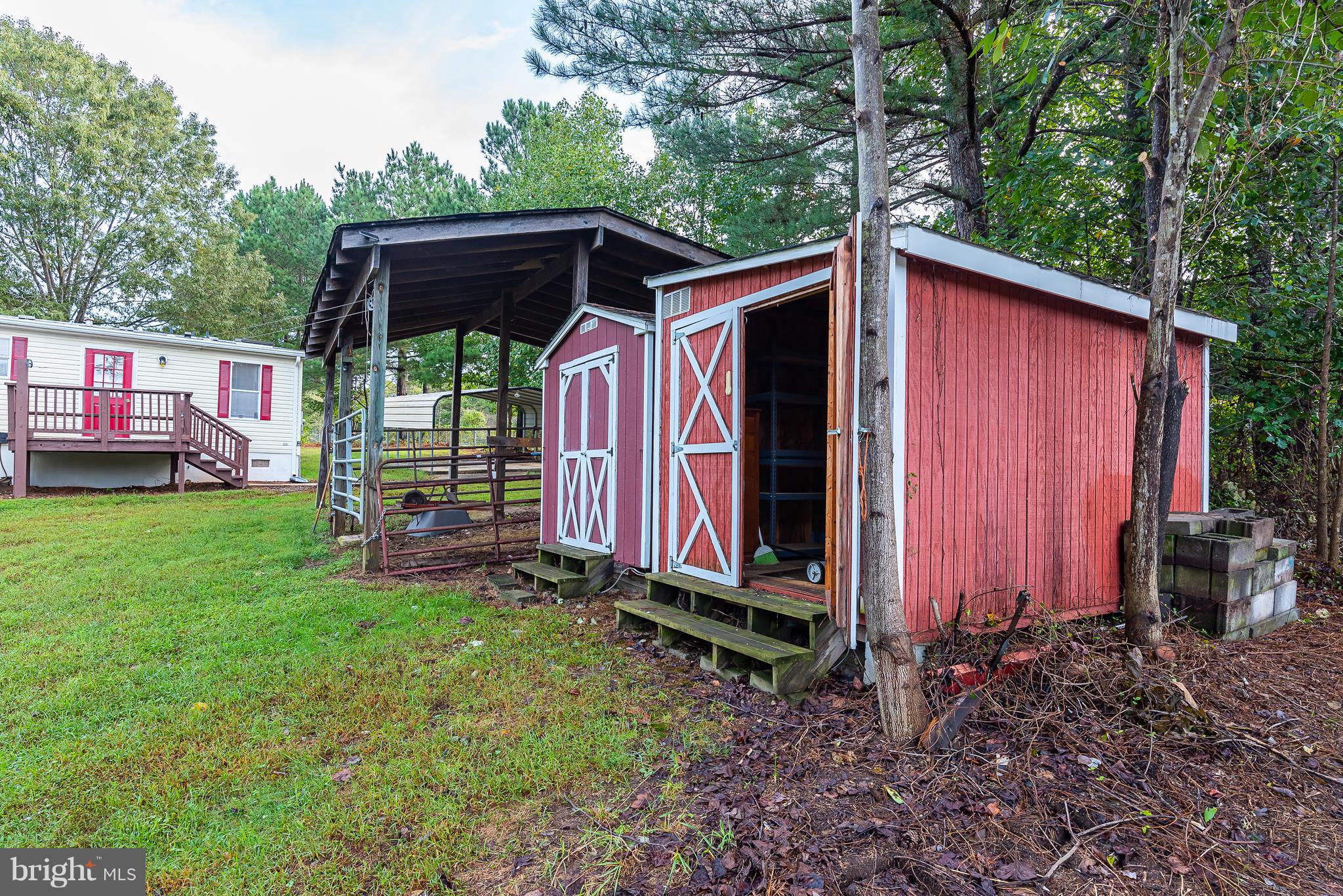 10000 Edenton Road Partlow, VA 22534 - Photo 22 of 30 a view of a small house with backyard