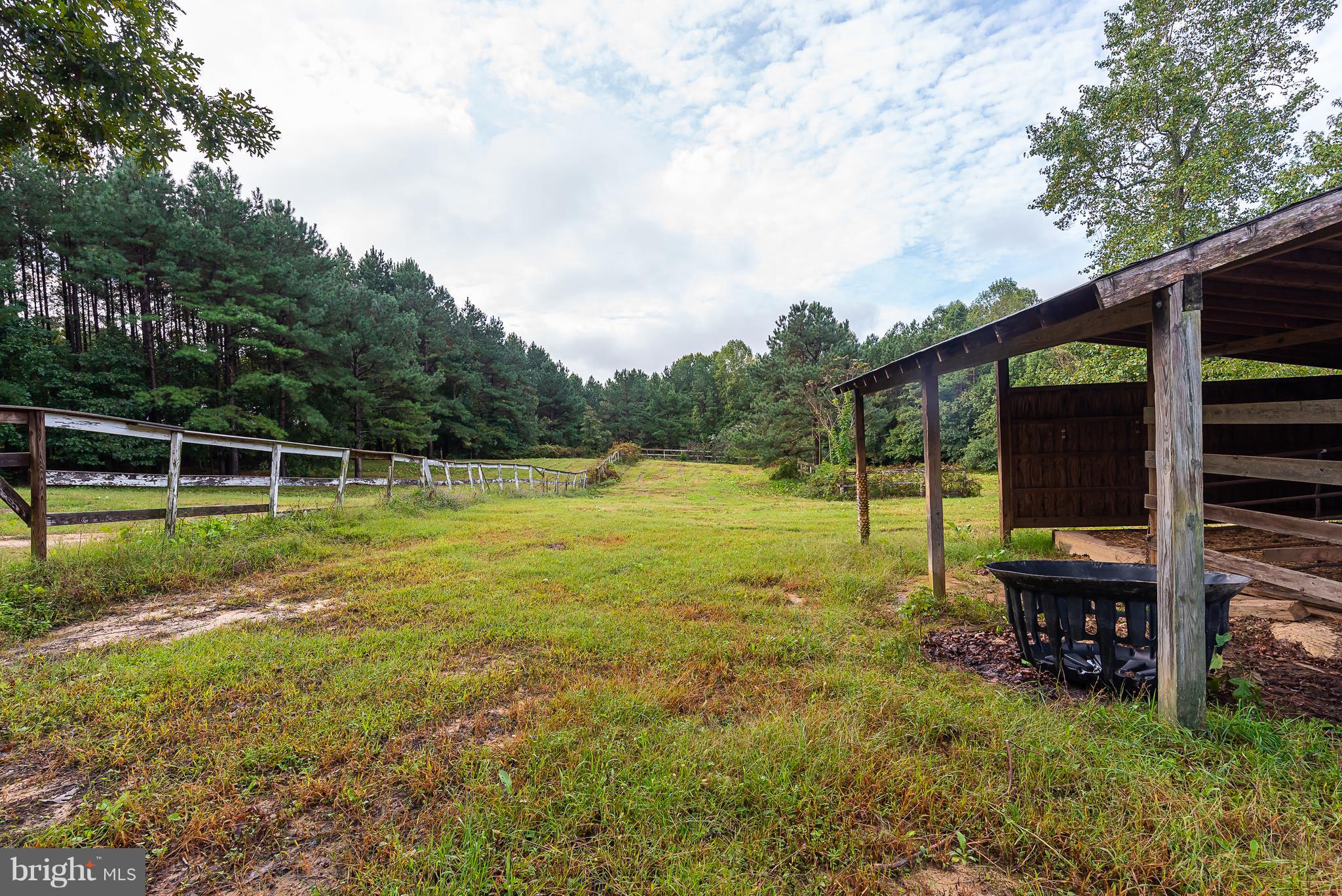 10000 Edenton Road Partlow, VA 22534 - Photo 24 of 30 a view of a swimming pool with a yard