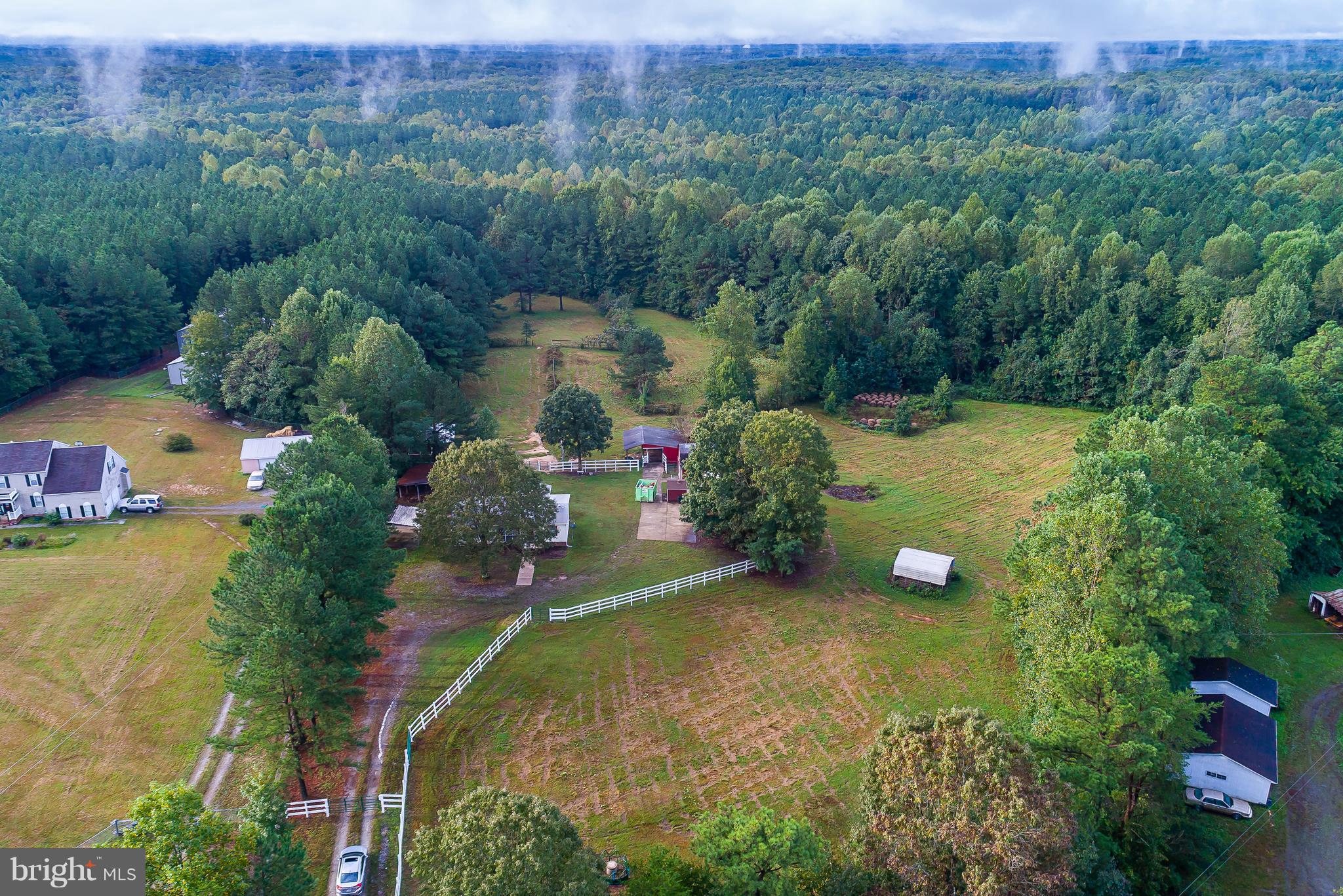 10000 Edenton Road Partlow, VA 22534 - Photo 27 of 30 an aerial view of a house with a yard and lake view