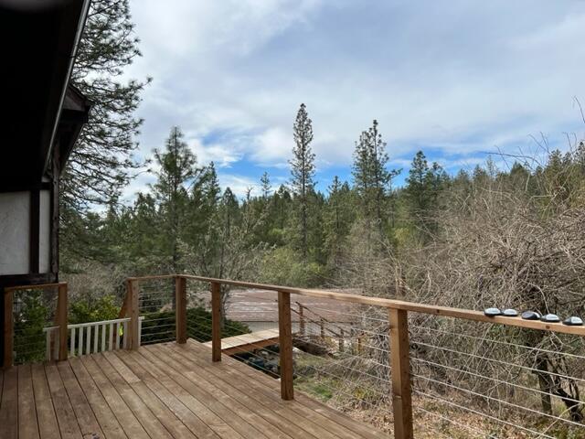 4196 East Evans Creek Road Rogue River, OR 97537 - Photo 10 of 36 a view of a balcony with outdoor seating