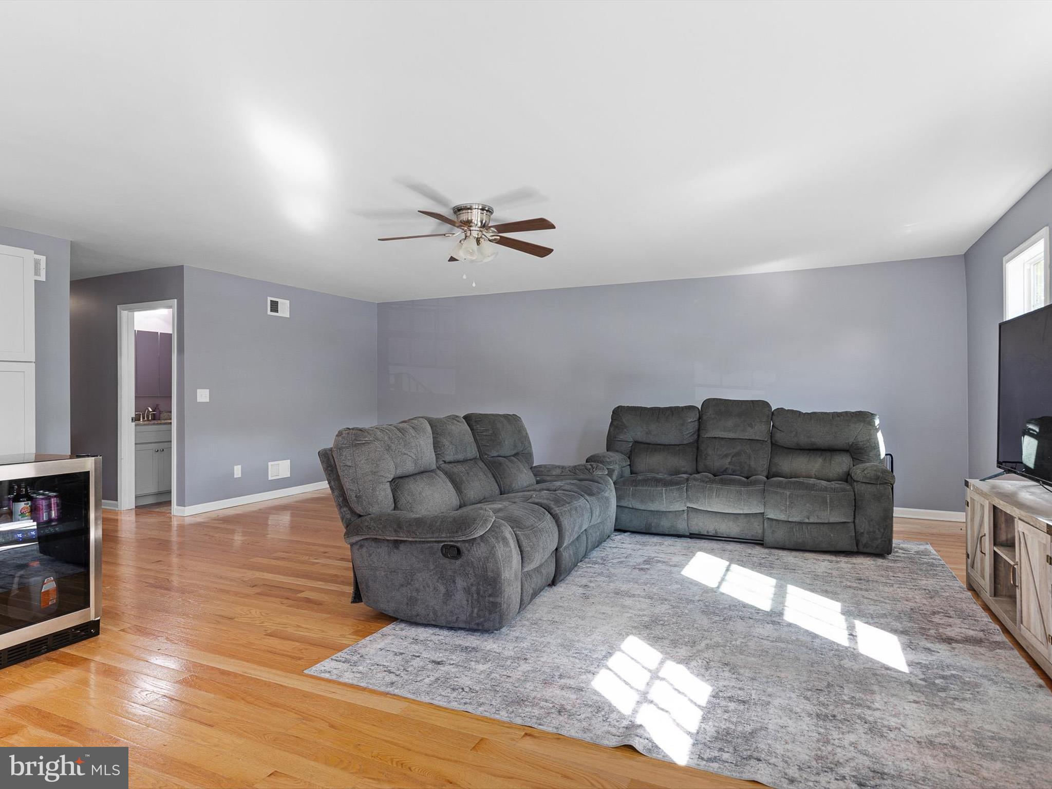 653 Mechanics Valley Road North East, MD 21901 - Photo 13 of 21 a living room with furniture and a wooden floor