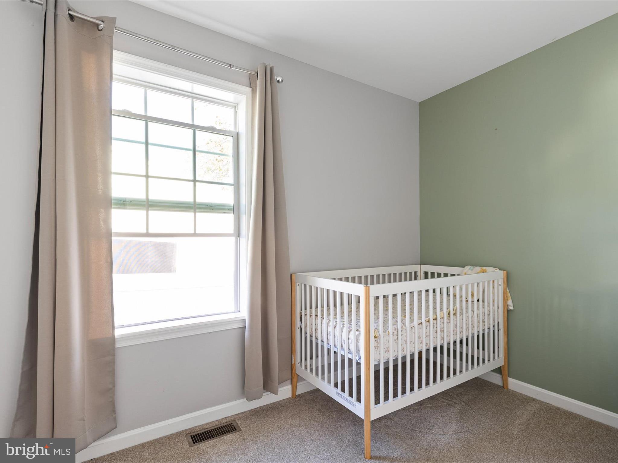 653 Mechanics Valley Road North East, MD 21901 - Photo 16 of 21 a view of a bedroom with a window