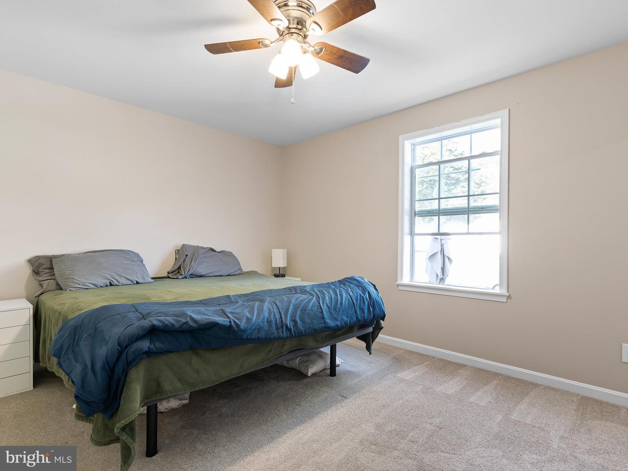 653 Mechanics Valley Road North East, MD 21901 - Photo 21 of 21 a spacious bedroom with a bed and window