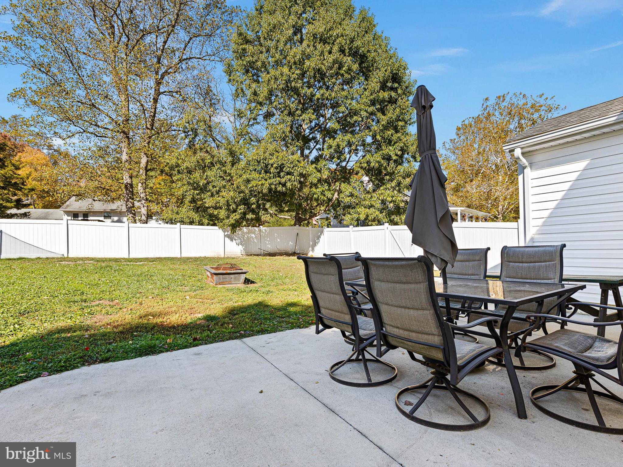 653 Mechanics Valley Road North East, MD 21901 - Photo 5 of 21 a view of a backyard with table and chairs