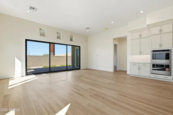 a view of kitchen with wooden floor