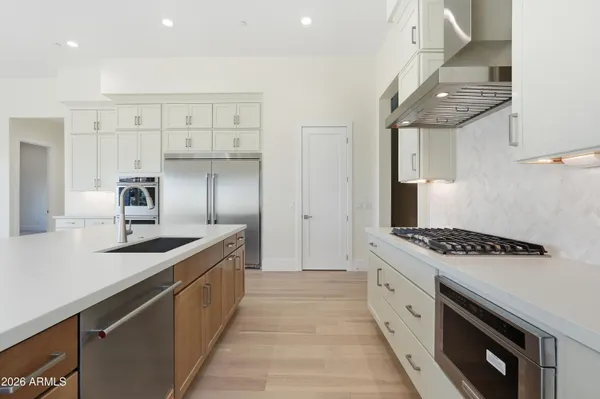 a view of an empty room with glass door