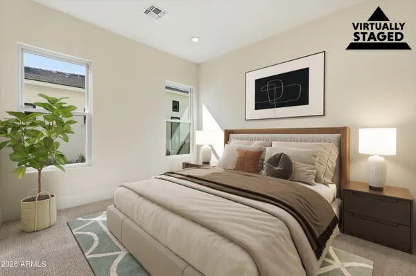 a bathroom with a shower sink and mirror
