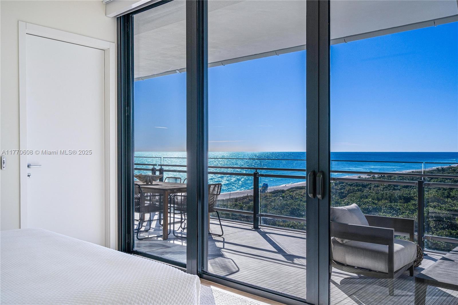 8701 Collins Avenue, Unit 804 Miami Beach, FL 33154 - Photo 17 of 25 a view of a room with window