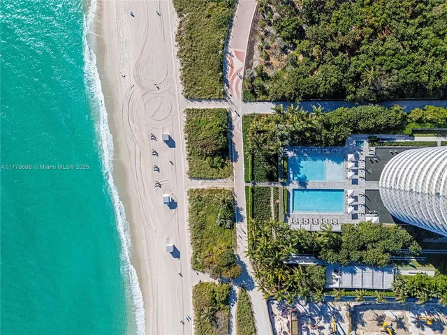 front view of a house with a garden