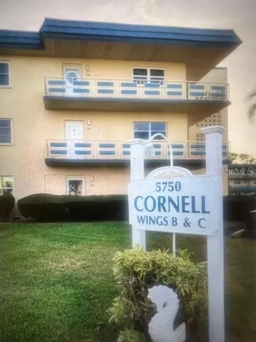 a kitchen with a stove and a microwave