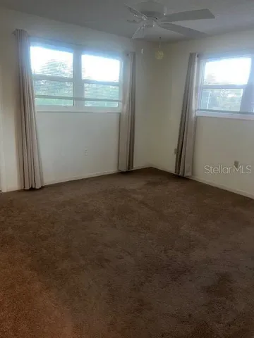 an empty room with window