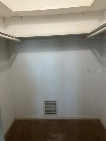 a view of a swimming pool with an ocean view