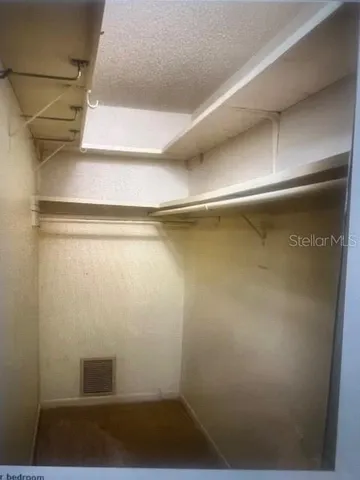 a room with storage and utility racks