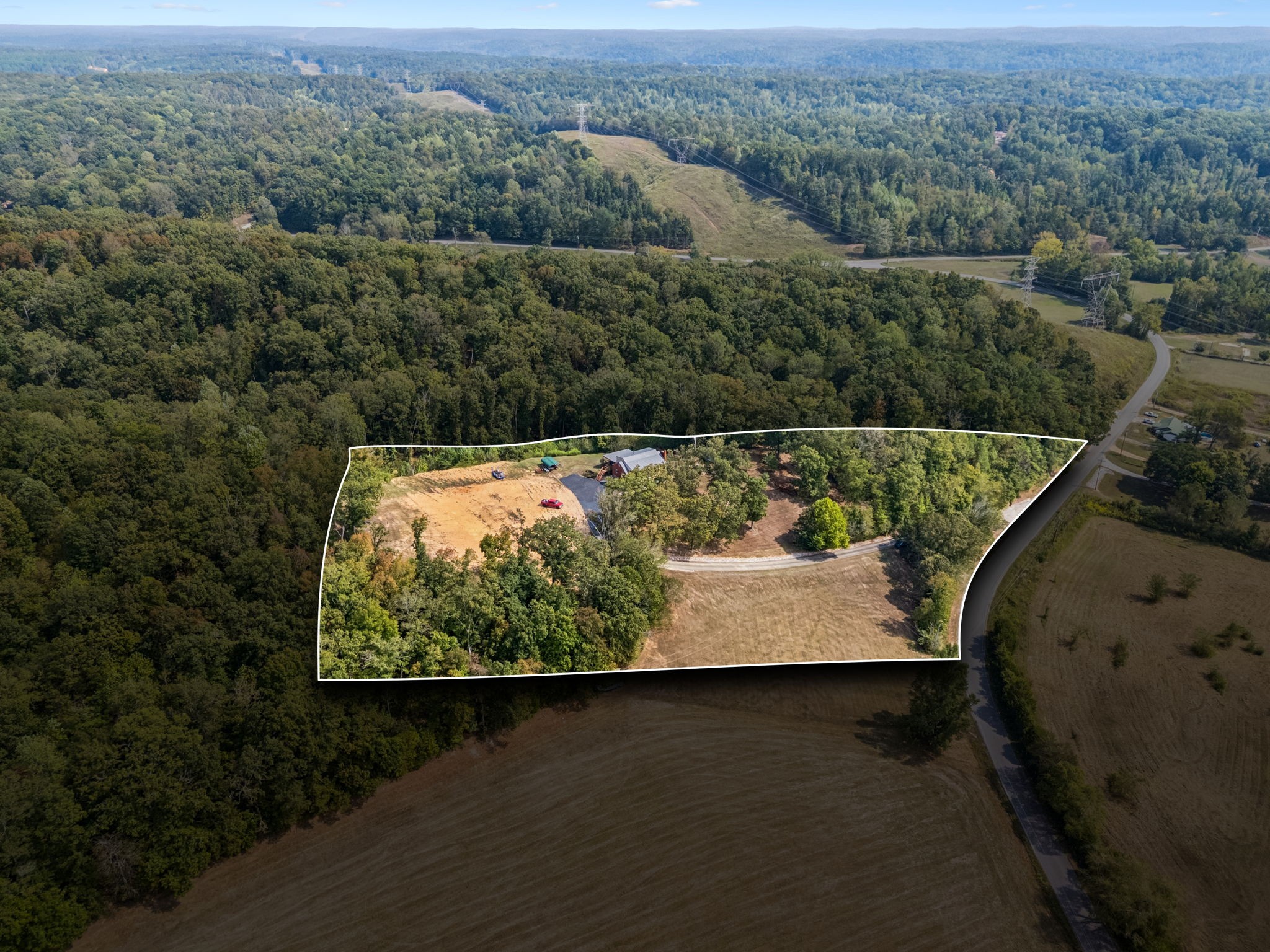 2151 Bakerville Road Waverly, TN 37185 - Photo 11 of 67 an aerial view of mountain with a swimming pool