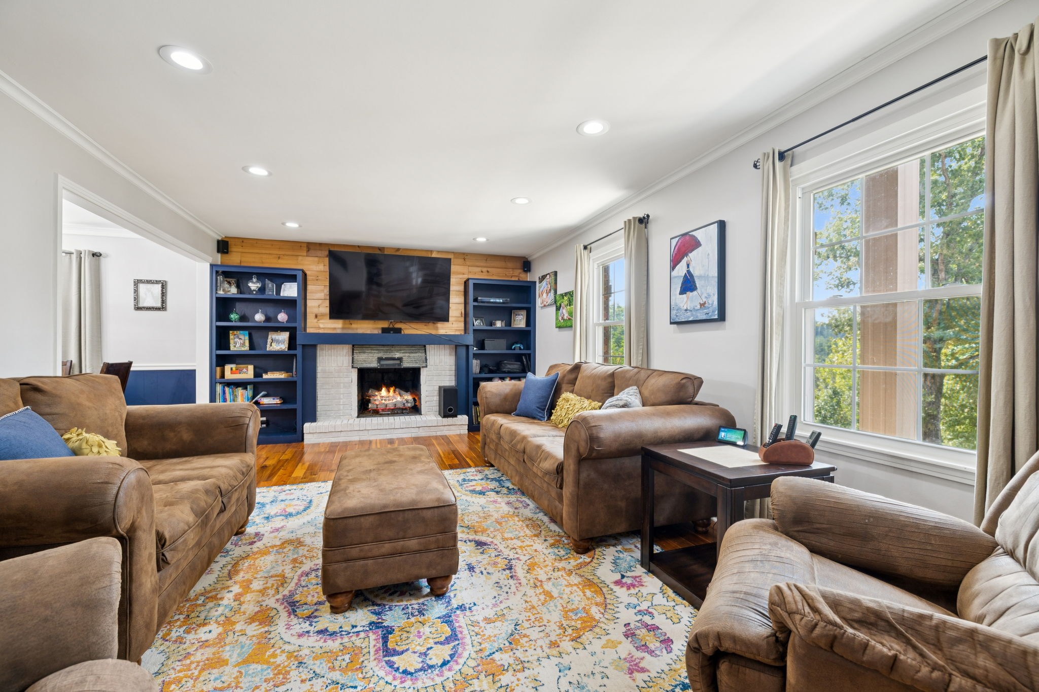 2151 Bakerville Road Waverly, TN 37185 - Photo 14 of 67 a living room with furniture fireplace and a large window