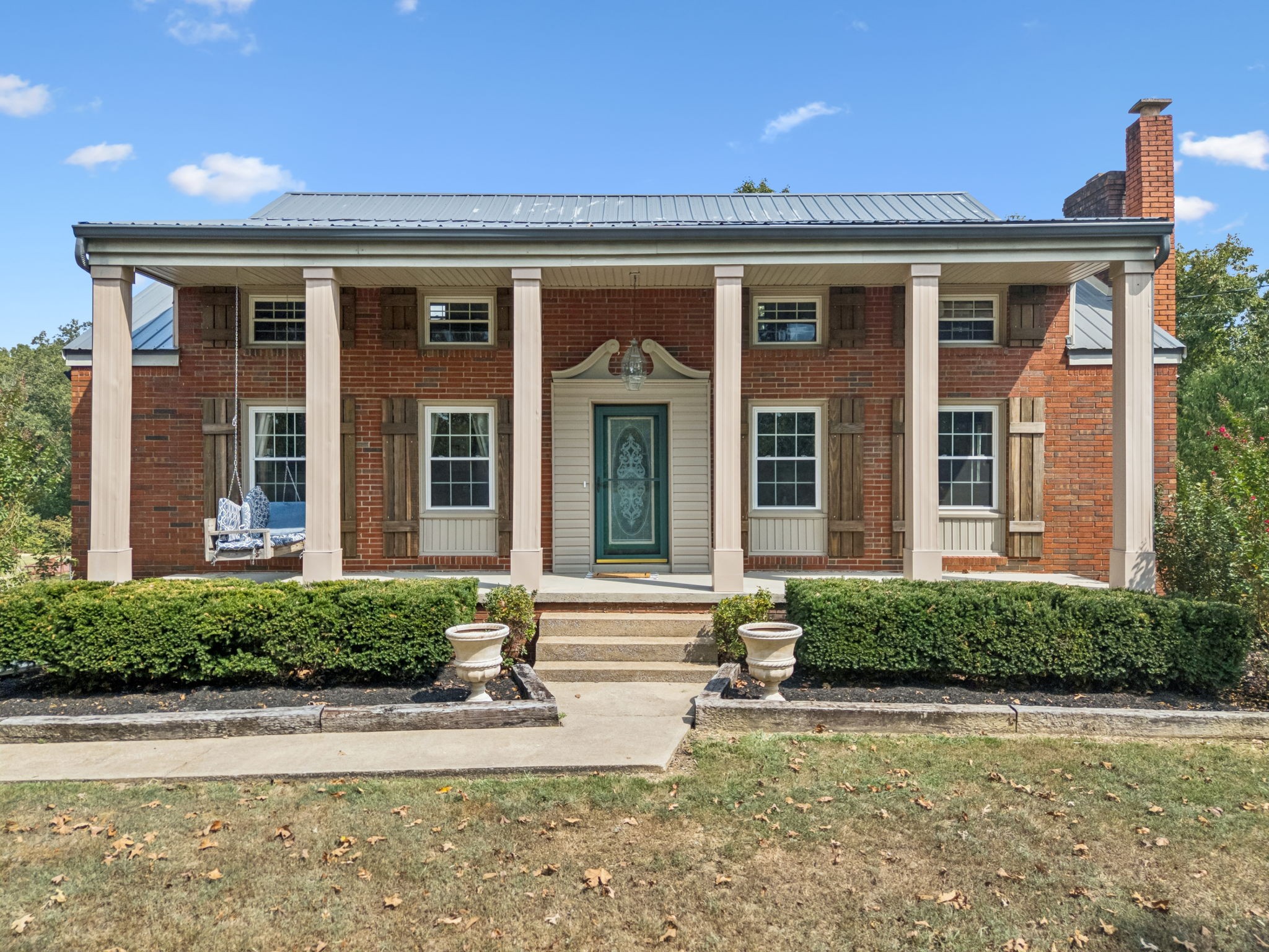 2151 Bakerville Road Waverly, TN 37185 - Photo 2 of 67 front view of a brick house with a yard