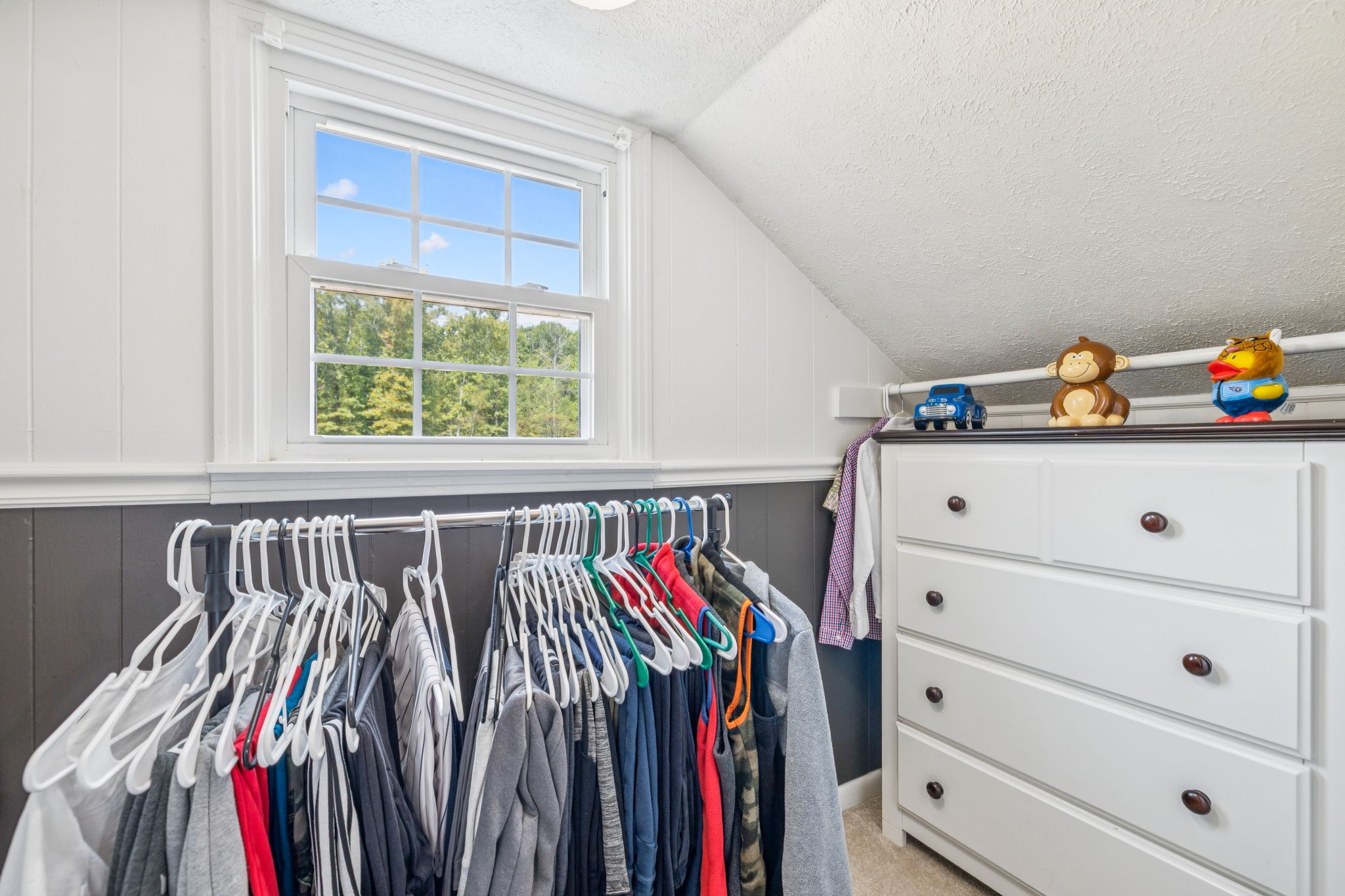 2151 Bakerville Road Waverly, TN 37185 - Photo 29 of 67 a view of walk in closet with clothes and shoes