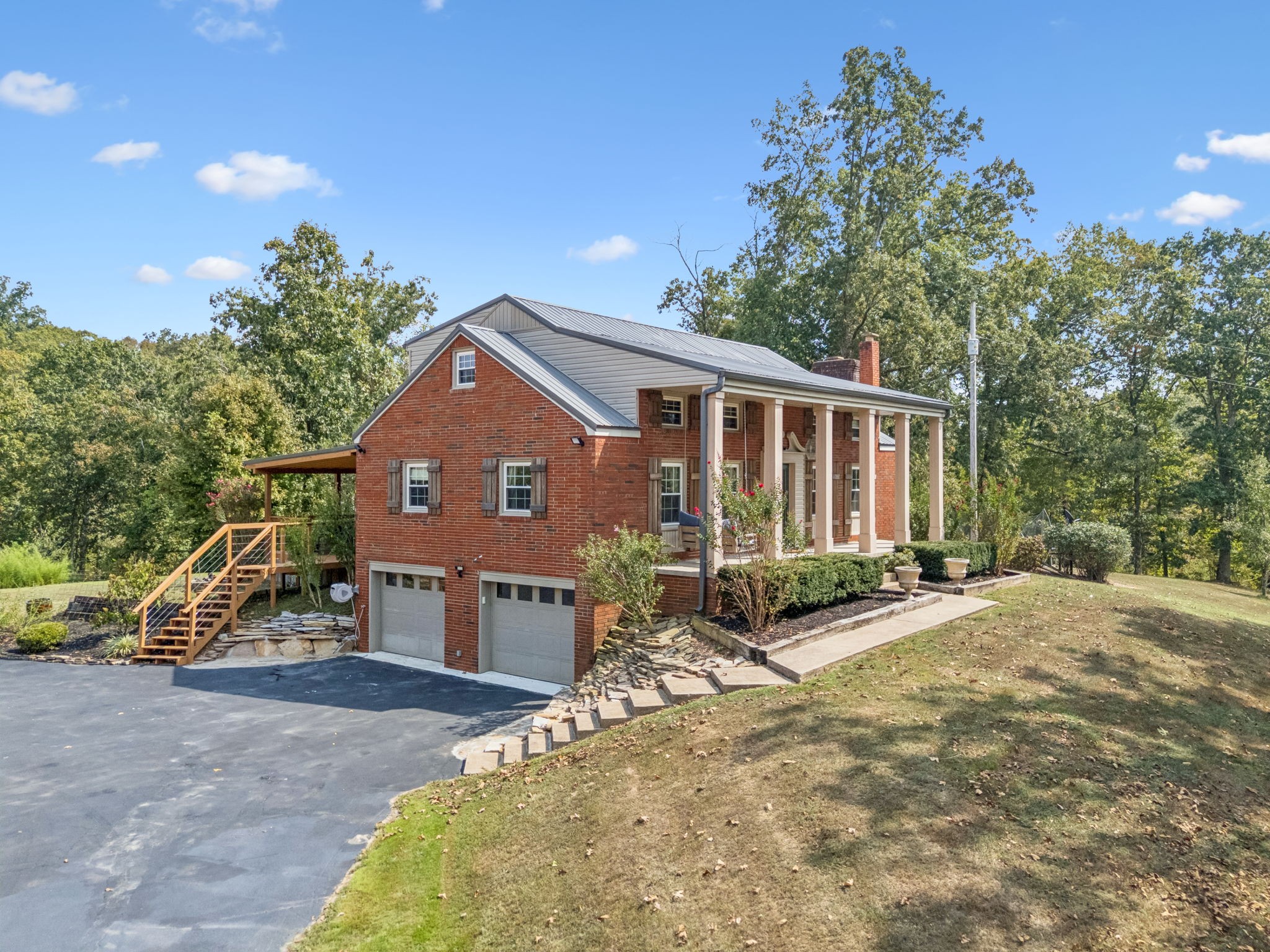 2151 Bakerville Road Waverly, TN 37185 - Photo 4 of 67 a view of a house with a yard and large tree