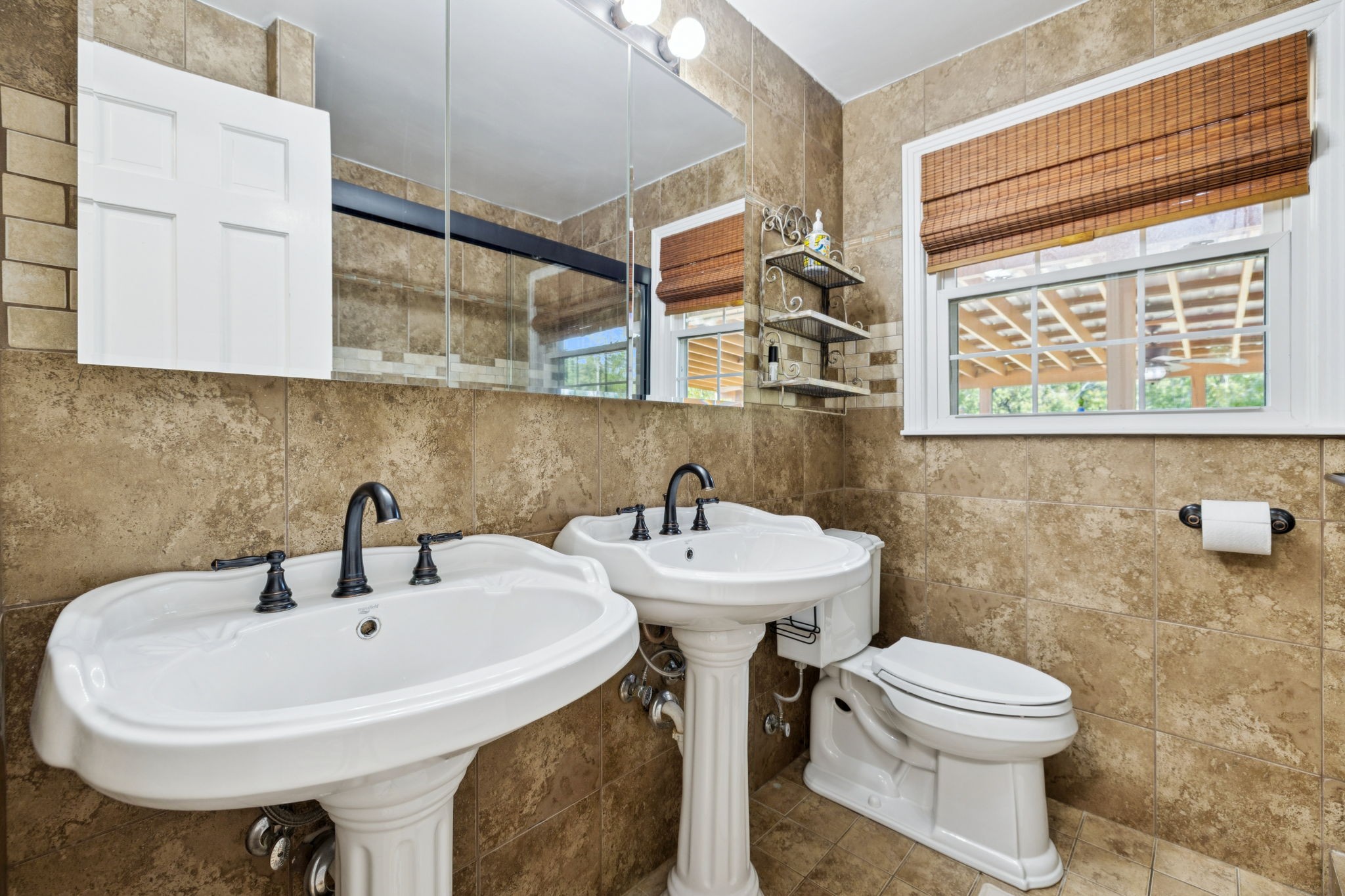 2151 Bakerville Road Waverly, TN 37185 - Photo 41 of 67 a bathroom with a sink a toilet and a mirror
