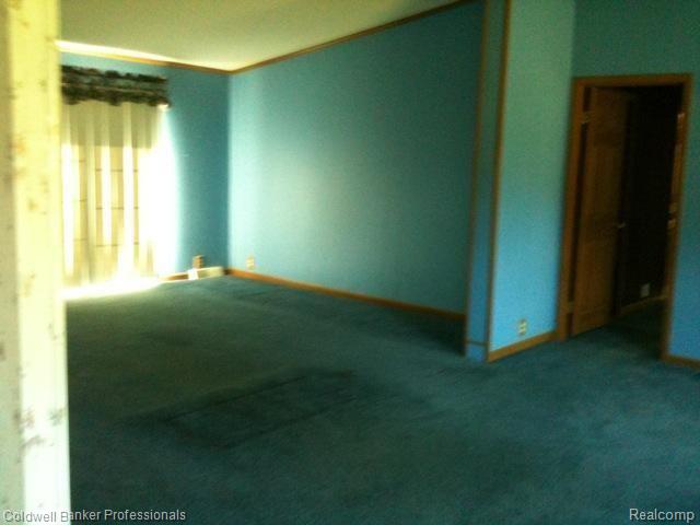 4393 Skelton Road Columbiaville, MI 48421 - Photo 10 of 13 Living and dining areas