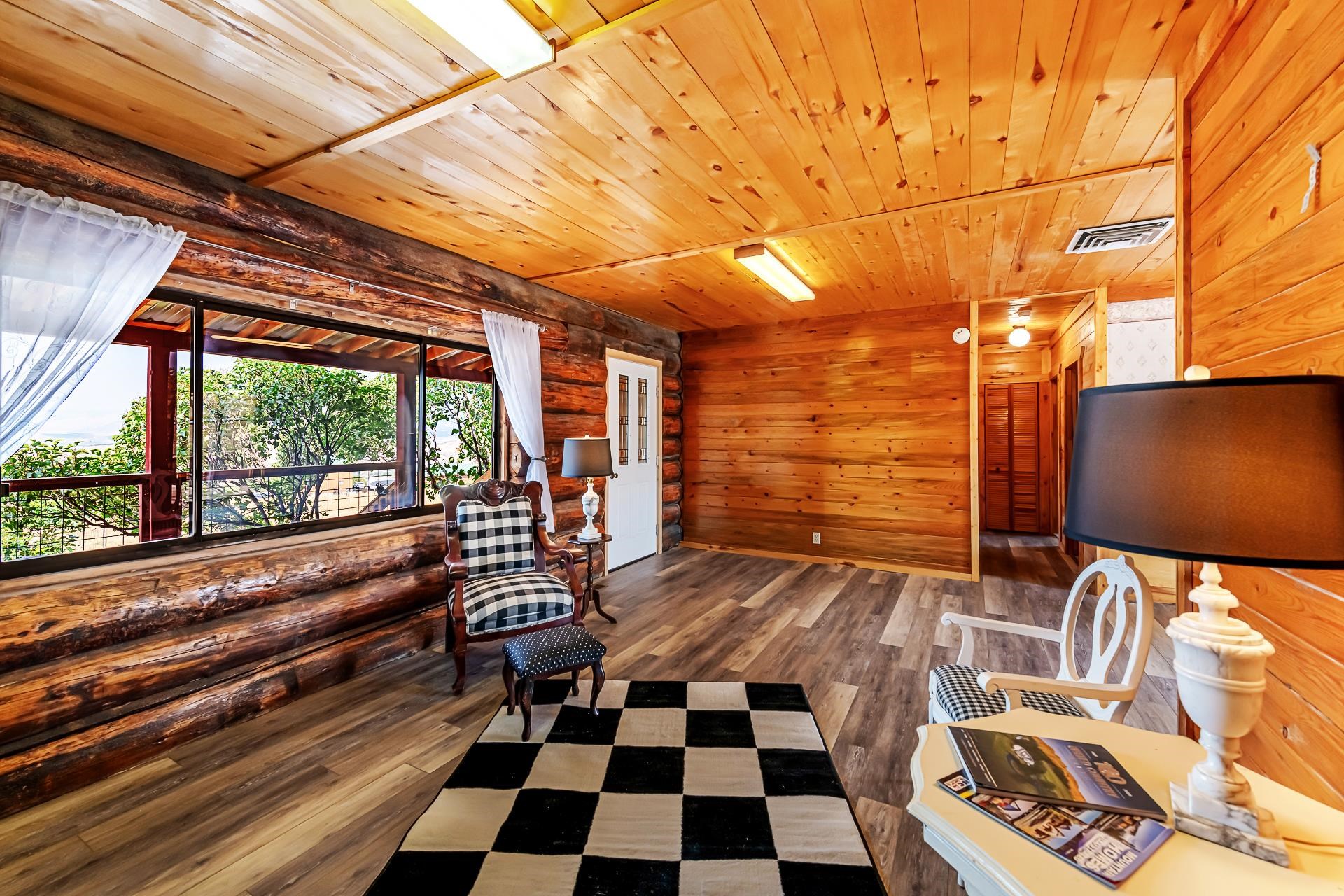 6194 County Road 320 Rifle, CO 81650 - Photo 12 of 42 a black and white checkered floor with a rug