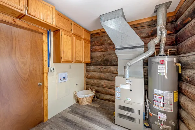 a view of a house with entryway and wooden floor