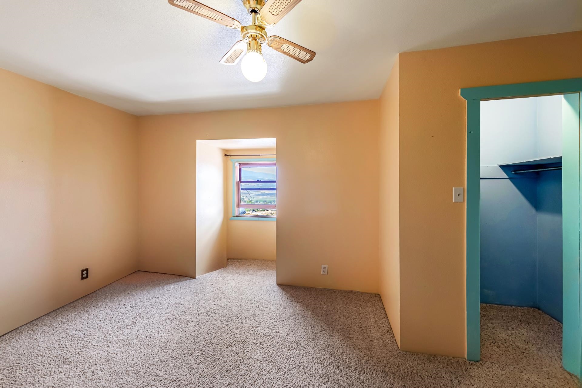 6194 County Road 320 Rifle, CO 81650 - Photo 22 of 42 a view of an empty room with a window