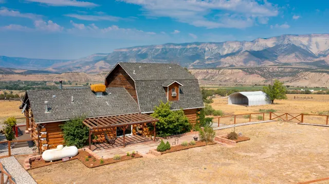 a view of swimming pool from a balcony