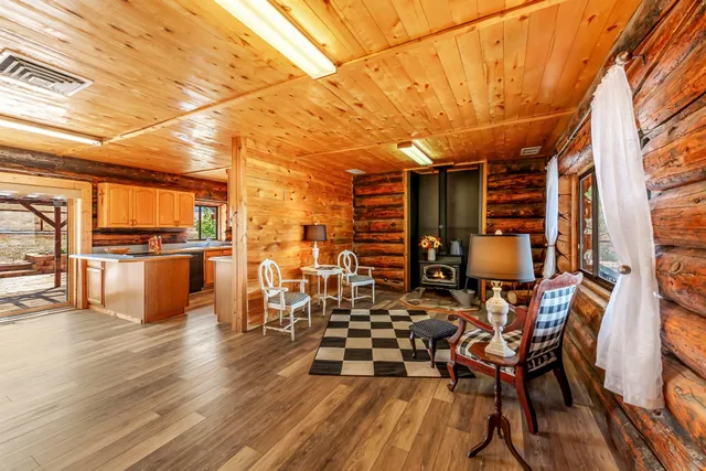 a view of a patio with table and chairs