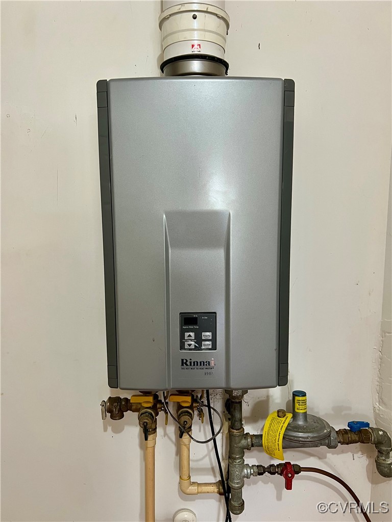 395 Kinsale Creek Road Kinsale, VA 22488 - Photo 13 of 41 a view of storage and utility room with washer and dryer