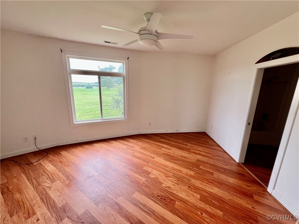 395 Kinsale Creek Road Kinsale, VA 22488 - Photo 18 of 41 wooden floor in an empty room with a window