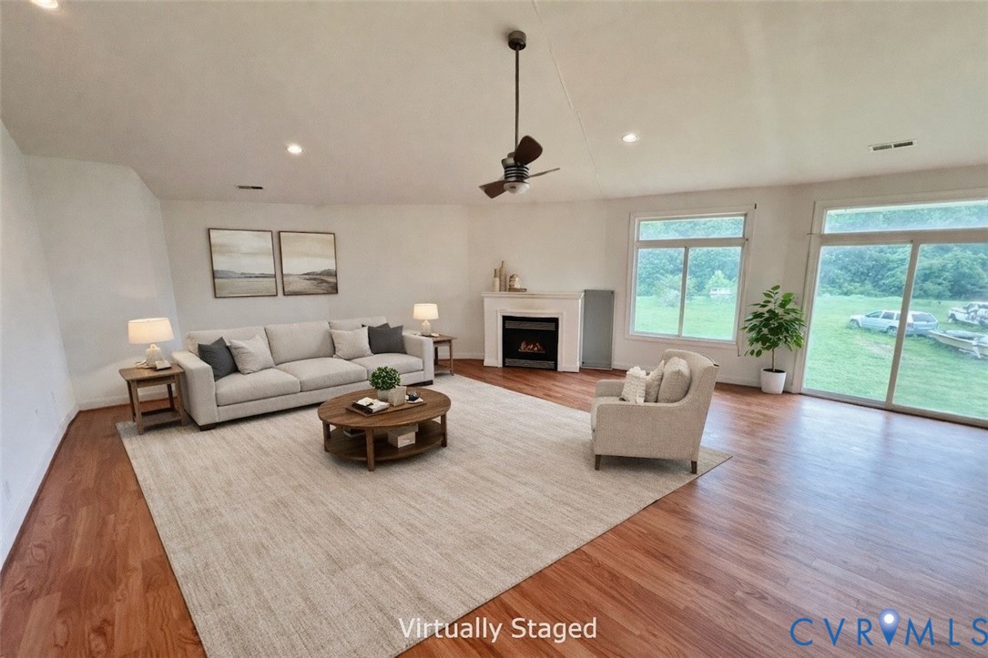 395 Kinsale Creek Road Kinsale, VA 22488 - Photo 25 of 41 a living room with furniture fireplace and window