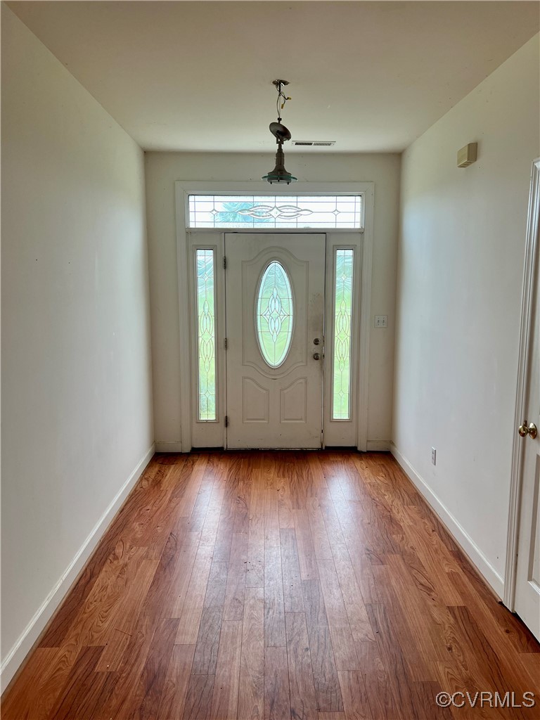 395 Kinsale Creek Road Kinsale, VA 22488 - Photo 3 of 41 a view of a hallway with wooden floor