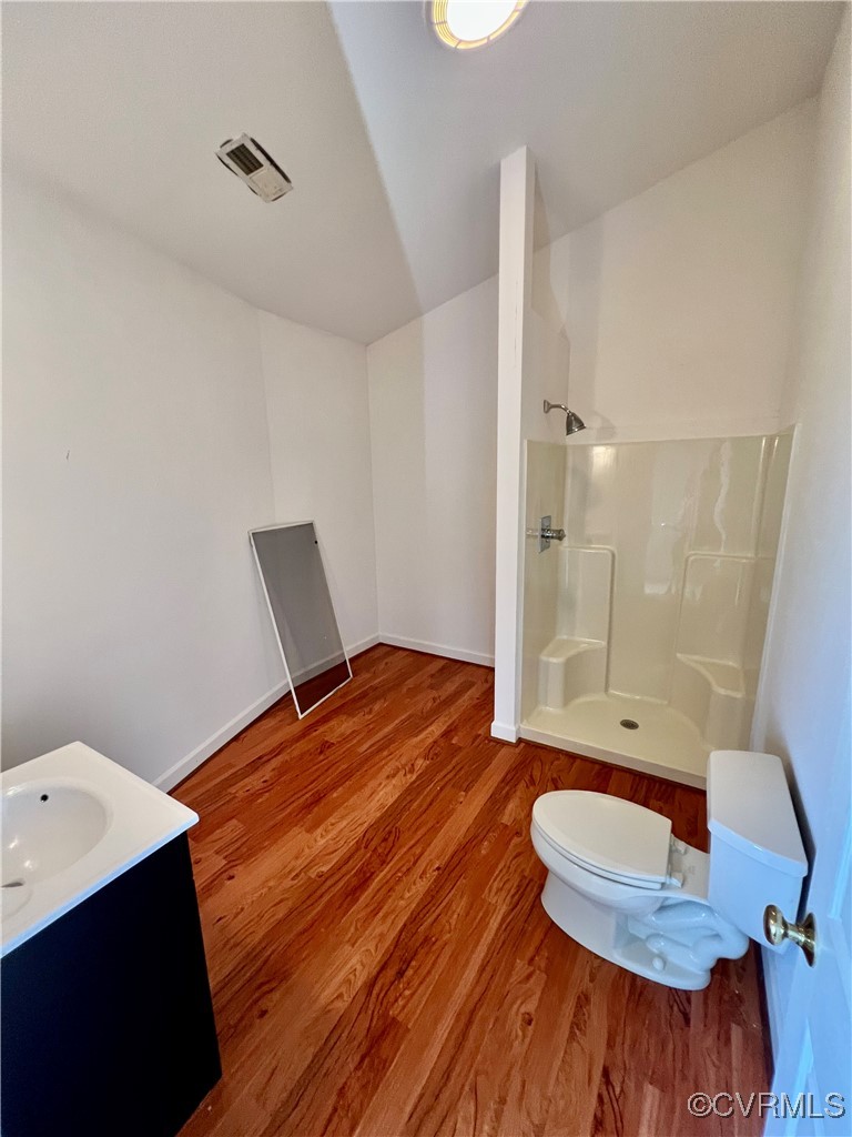 395 Kinsale Creek Road Kinsale, VA 22488 - Photo 37 of 41 a bedroom with a bed and a chair