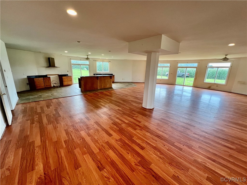 395 Kinsale Creek Road Kinsale, VA 22488 - Photo 6 of 41 a view of a living room a kitchen and a hard wood floor